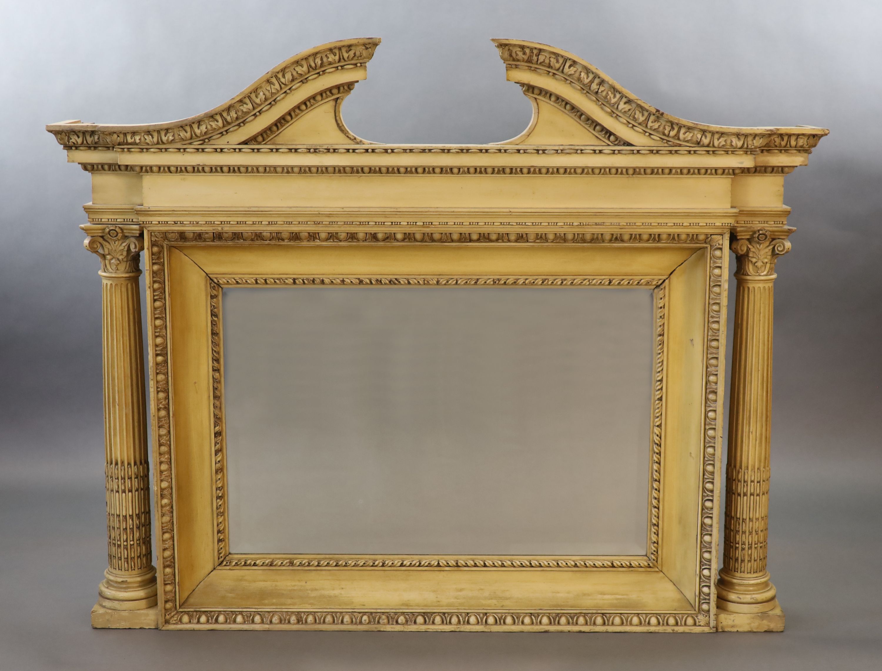 A Victorian Adam style cream painted beech overmantel, W.154cm D.20cm H.124cm